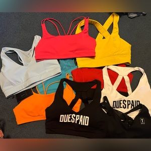 Lot of 9 1stPhorm sports bras size medium. Some NWT, all excellent condition!